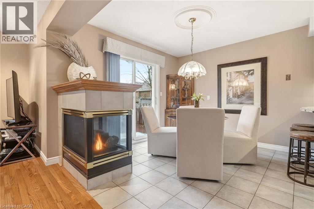 Cozy Breakfast Room w/3 sided Fireplace - 1156 Augustus Drive, Burlington, ON - Indoor With Fireplace