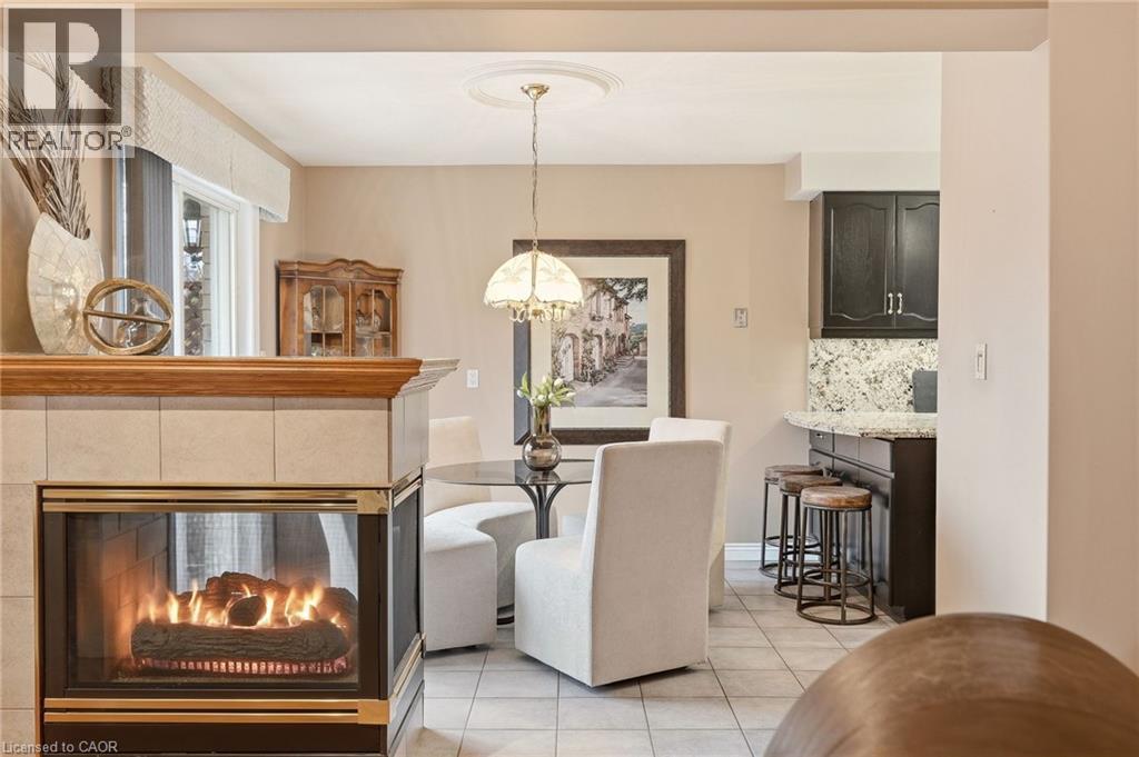 Cozy 3 sided Fireplace - 1156 Augustus Drive, Burlington, ON - Indoor With Fireplace