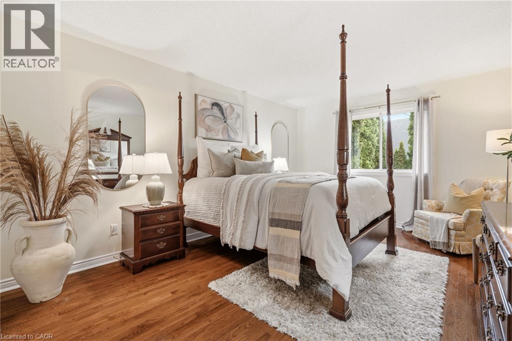 Lovely Primary with Hardwood & views to the backyard - 1156 Augustus Drive, Burlington, ON - Indoor Photo Showing Bedroom