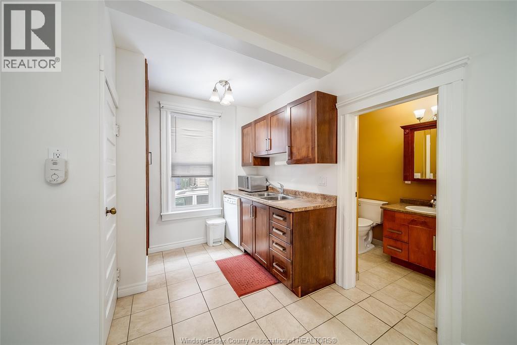 151 Curry Ave, Windsor, ON - Indoor Photo Showing Kitchen With Double Sink