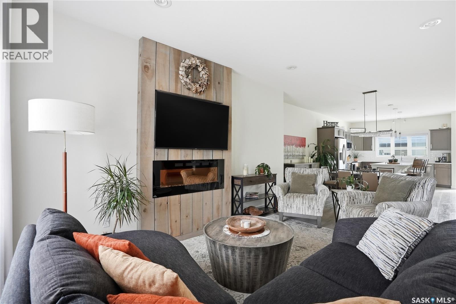 118 3Rd Street E, Saskatoon, SK - Indoor Photo Showing Living Room With Fireplace