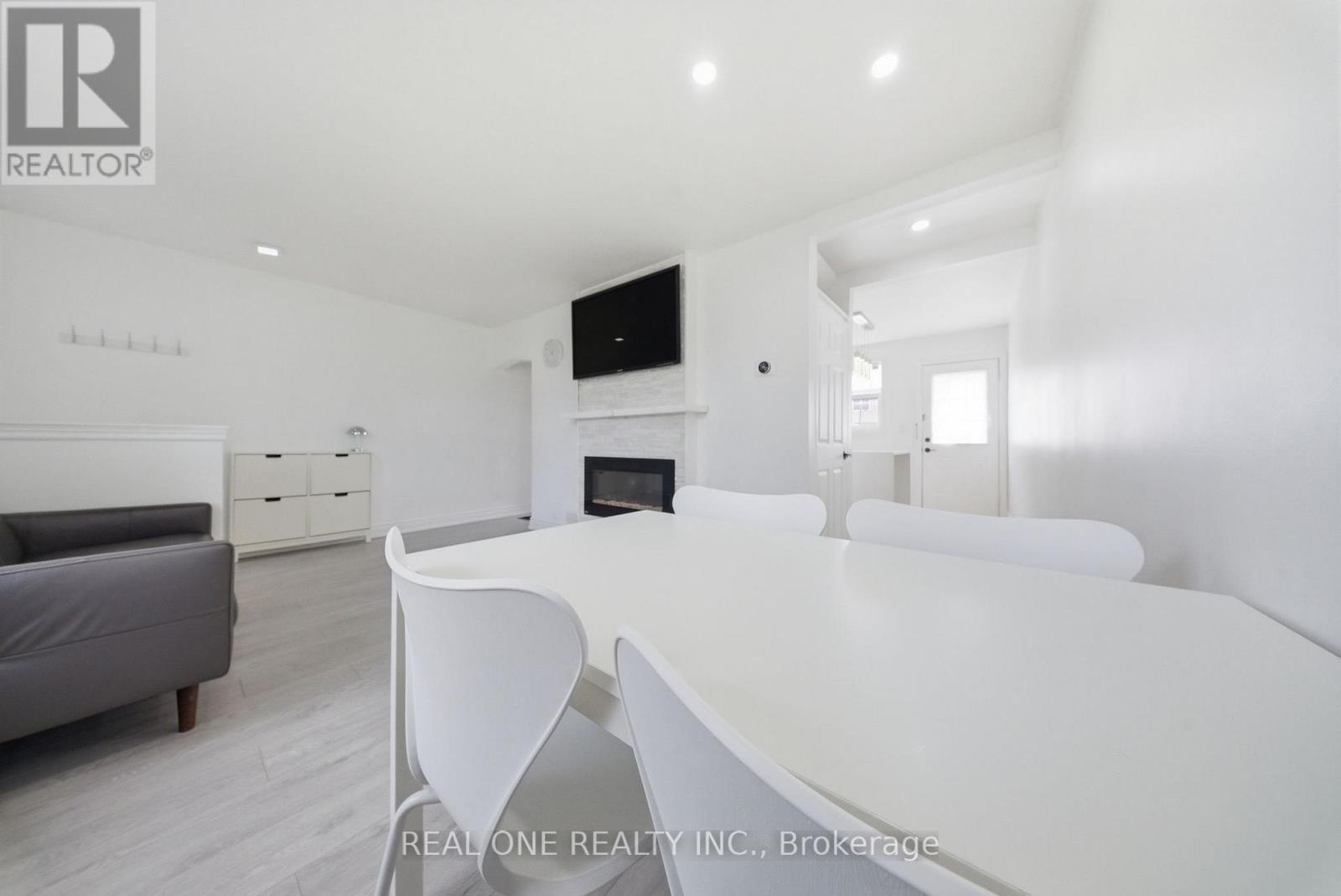 24 Sumach Street, Hamilton, ON - Indoor Photo Showing Other Room With Fireplace