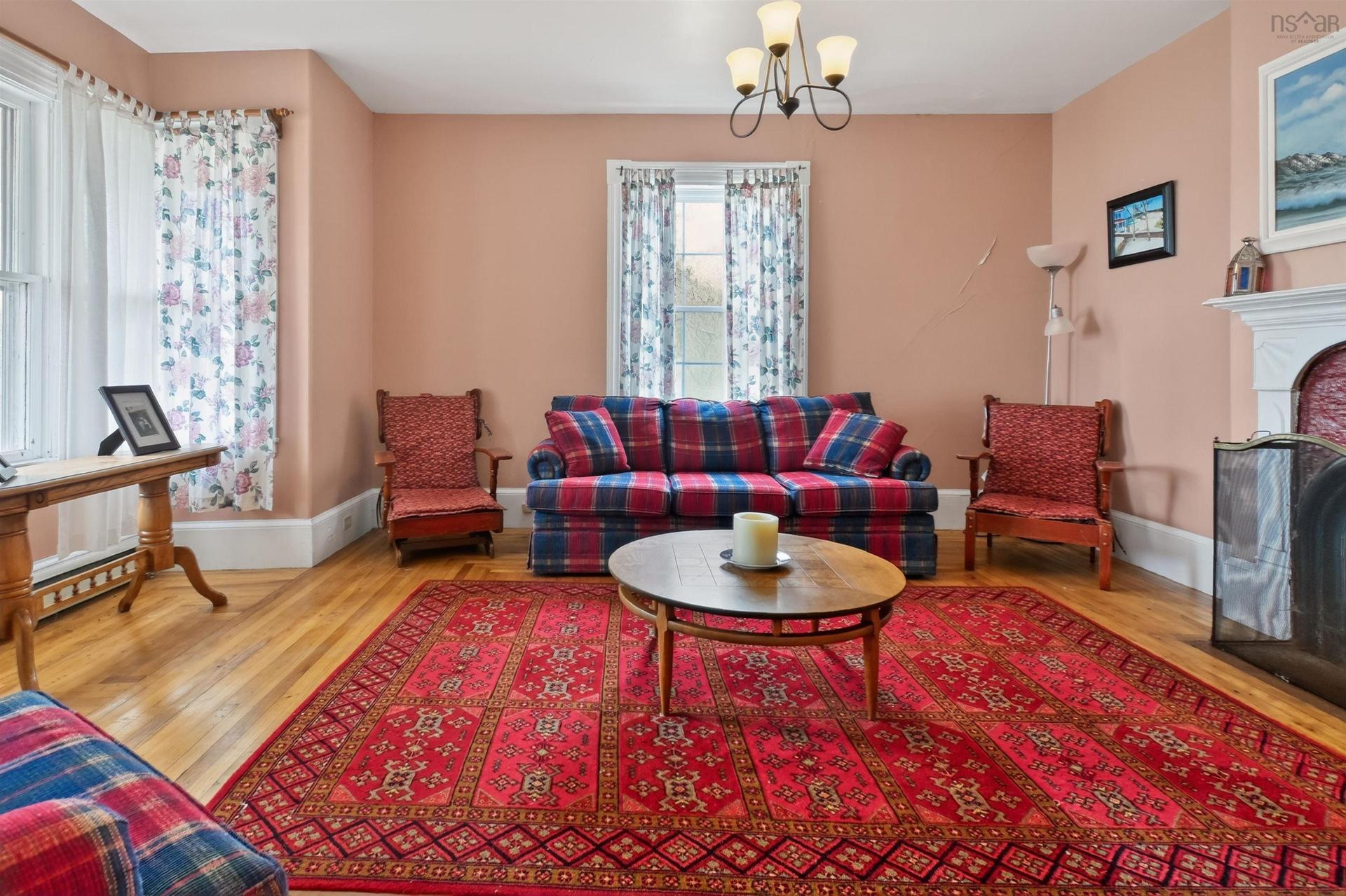 2145 Marble Mountain Rd, West Bay, NS - Indoor Photo Showing Living Room With Fireplace