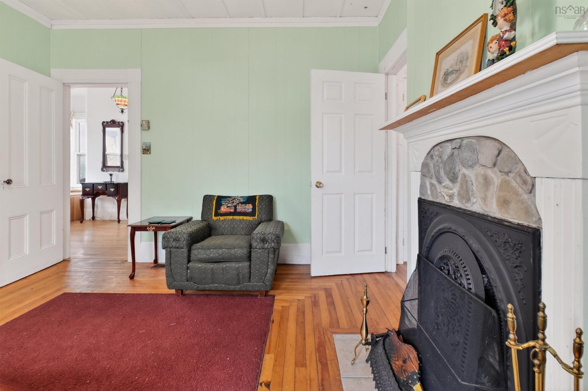 2145 Marble Mountain Rd, West Bay, NS - Indoor Photo Showing Other Room With Fireplace
