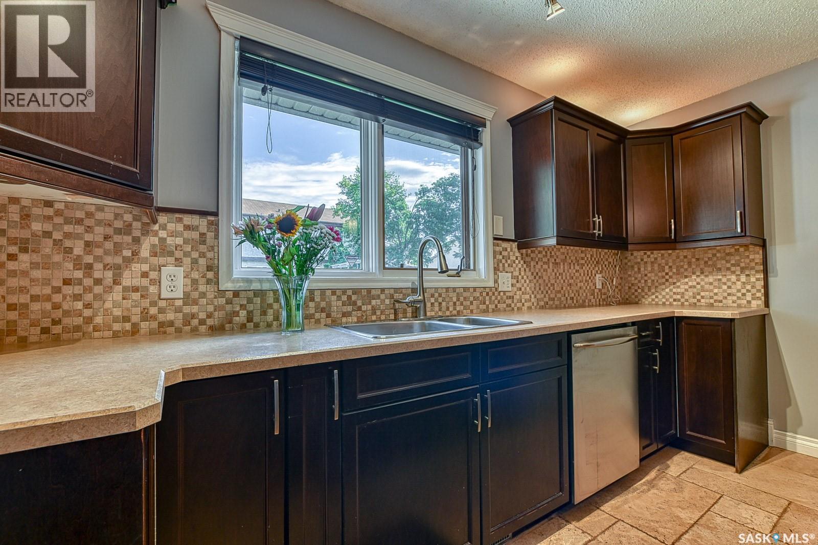2102 Truesdale Drive E, Regina, SK - Indoor Photo Showing Kitchen With Double Sink