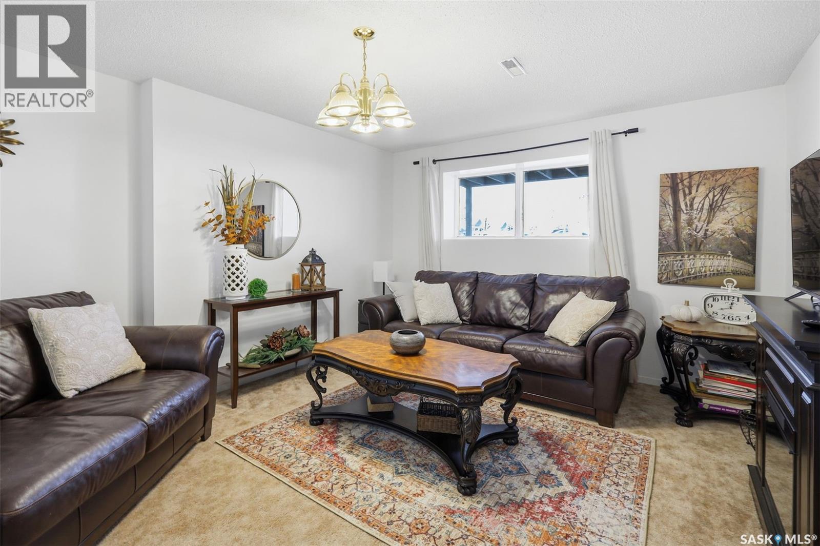 6 80 Berini Drive, Saskatoon, SK - Indoor Photo Showing Living Room