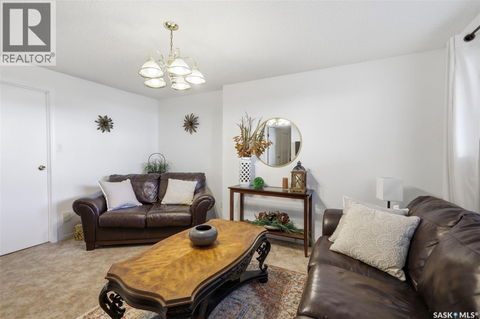 6 80 Berini Drive, Saskatoon, SK - Indoor Photo Showing Living Room