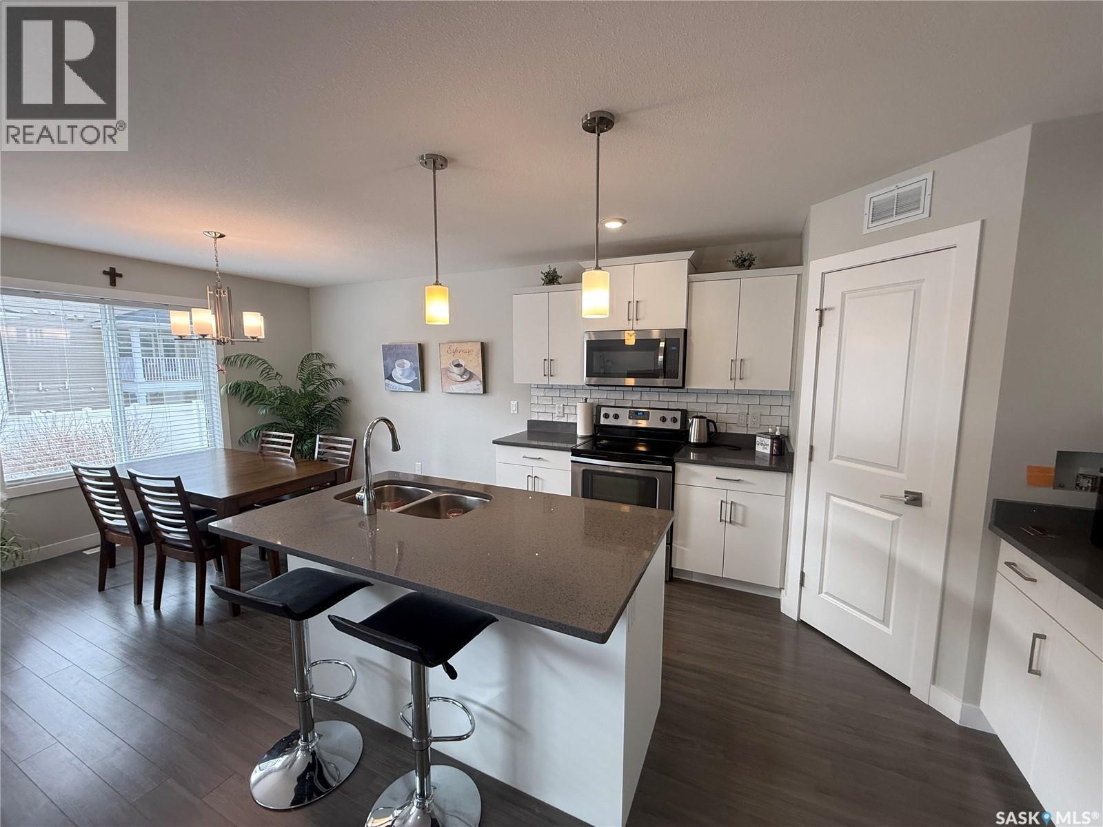 1061 Kolynchuk Crescent, Saskatoon, SK - Indoor Photo Showing Kitchen With Double Sink With Upgraded Kitchen