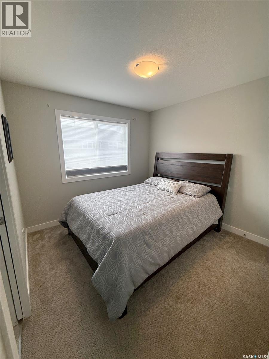 1061 Kolynchuk Crescent, Saskatoon, SK - Indoor Photo Showing Bedroom