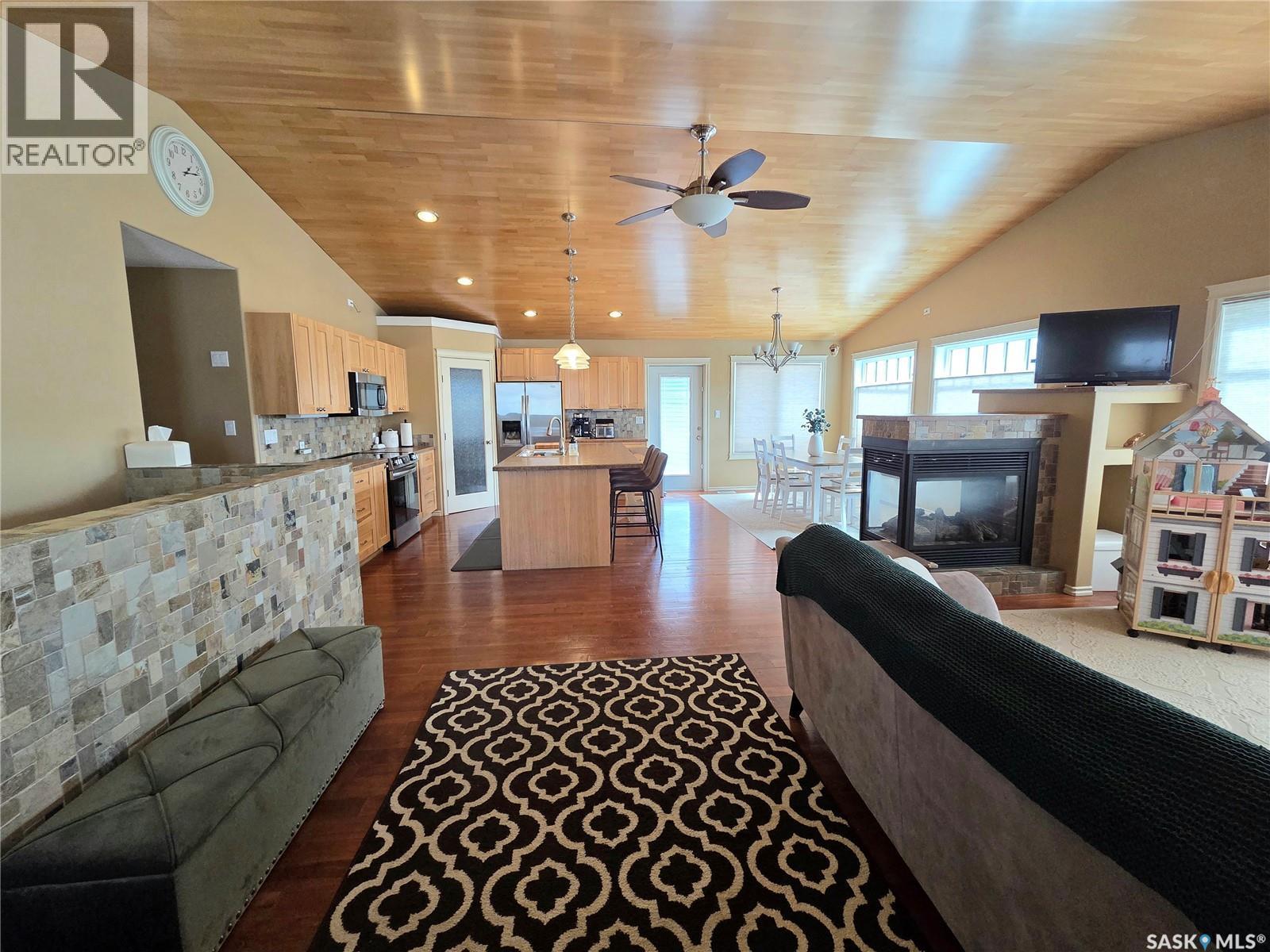 214 5Th Street, Milestone, SK - Indoor Photo Showing Living Room With Fireplace