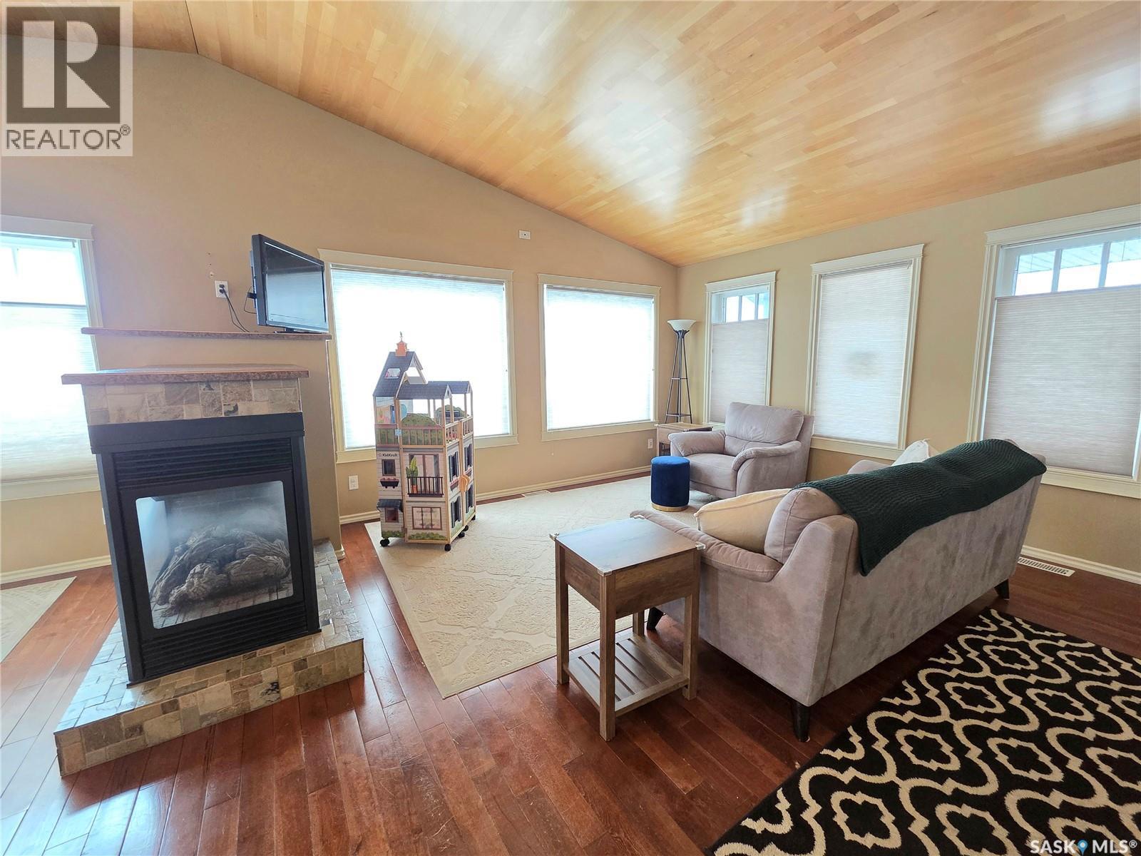 214 5Th Street, Milestone, SK - Indoor Photo Showing Living Room With Fireplace
