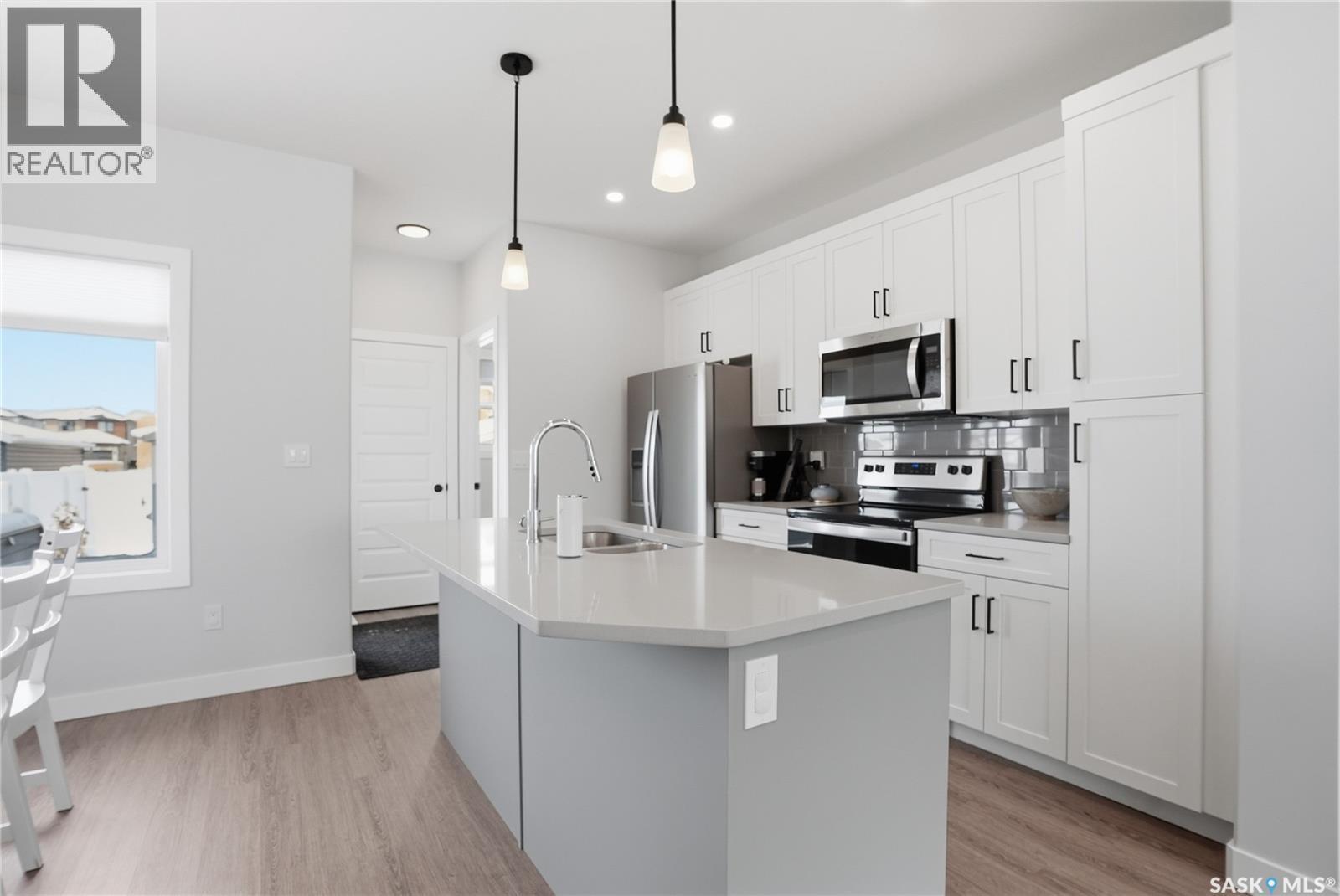 1047 Brighton Gate, Saskatoon, SK - Indoor Photo Showing Kitchen With Stainless Steel Kitchen With Upgraded Kitchen