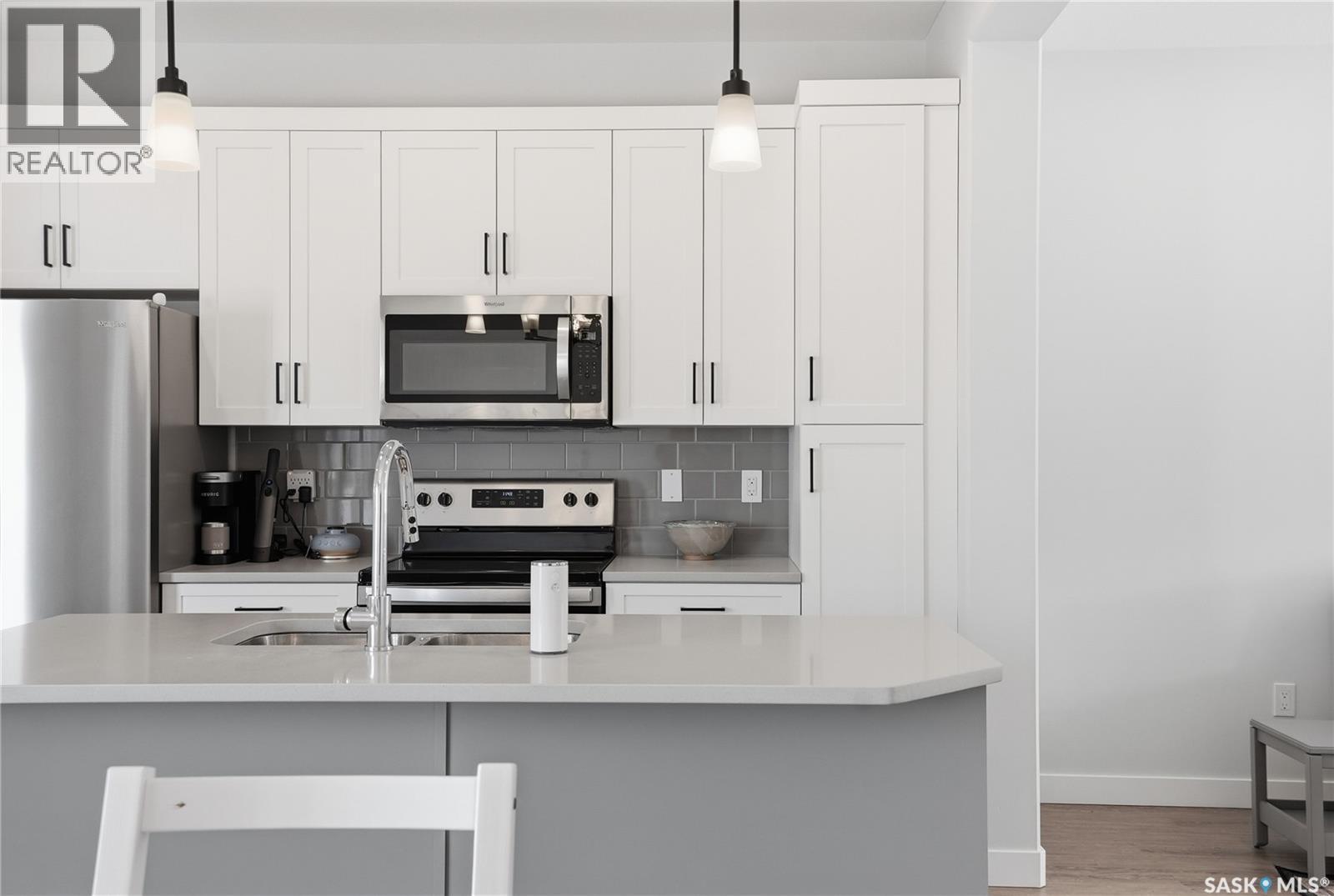 1047 Brighton Gate, Saskatoon, SK - Indoor Photo Showing Kitchen With Stainless Steel Kitchen With Upgraded Kitchen