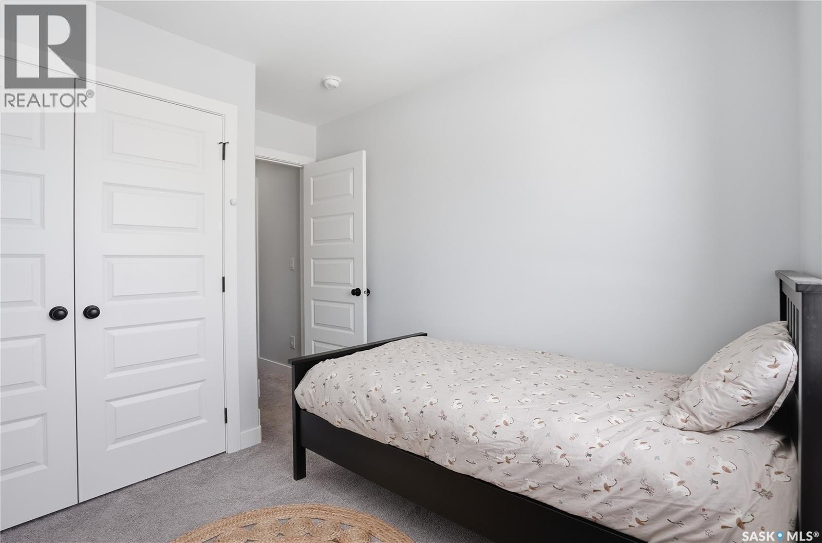 1047 Brighton Gate, Saskatoon, SK - Indoor Photo Showing Bedroom