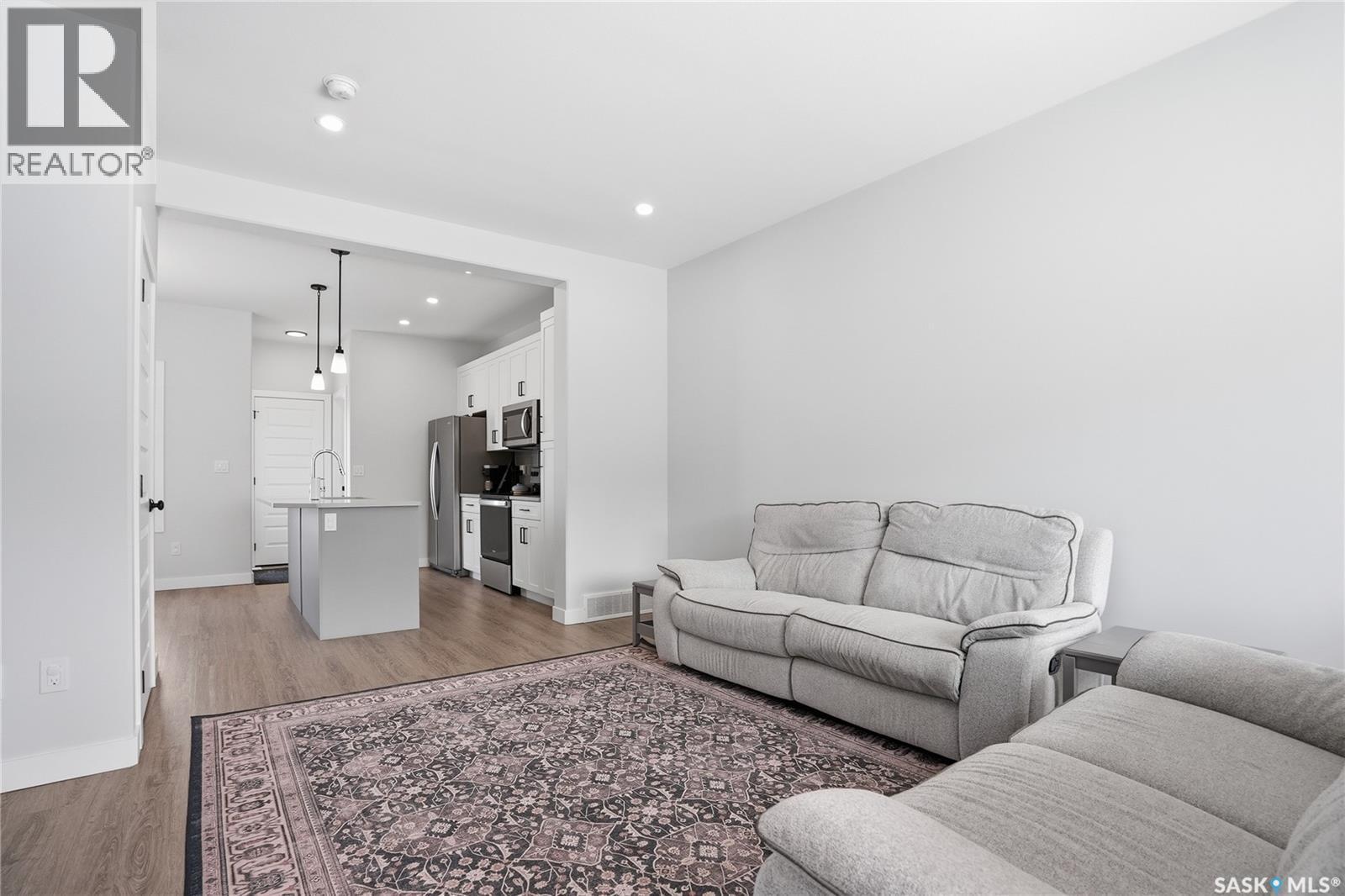 1047 Brighton Gate, Saskatoon, SK - Indoor Photo Showing Living Room