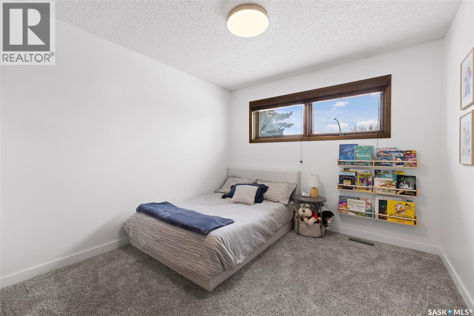 2002 Braun Bay E, Regina, SK - Indoor Photo Showing Bedroom