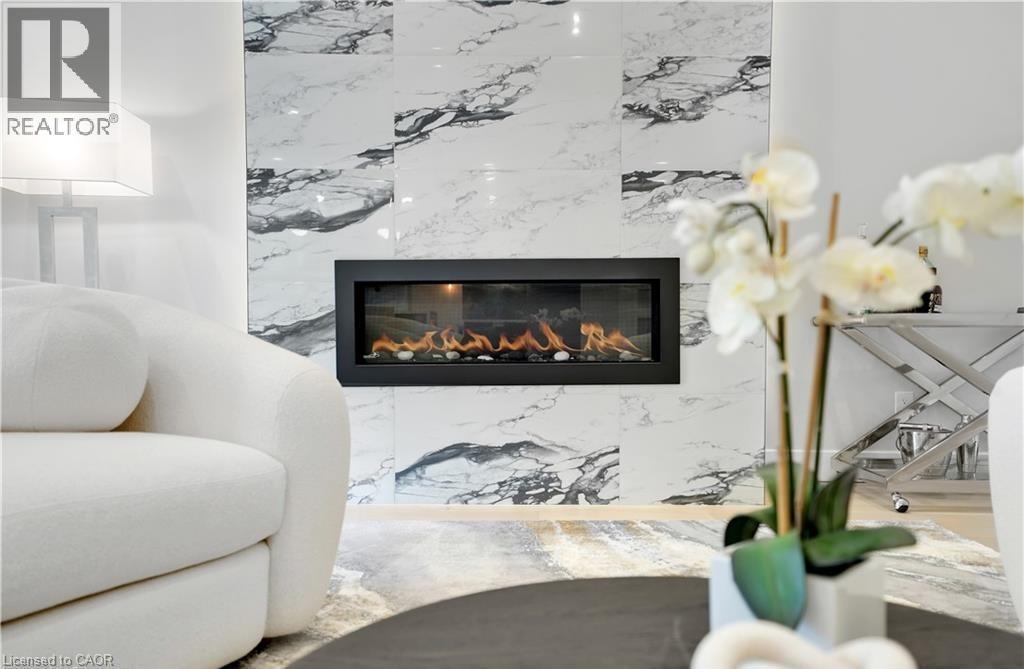 239 Corrie Crescent, Waterloo, ON - Indoor Photo Showing Living Room With Fireplace