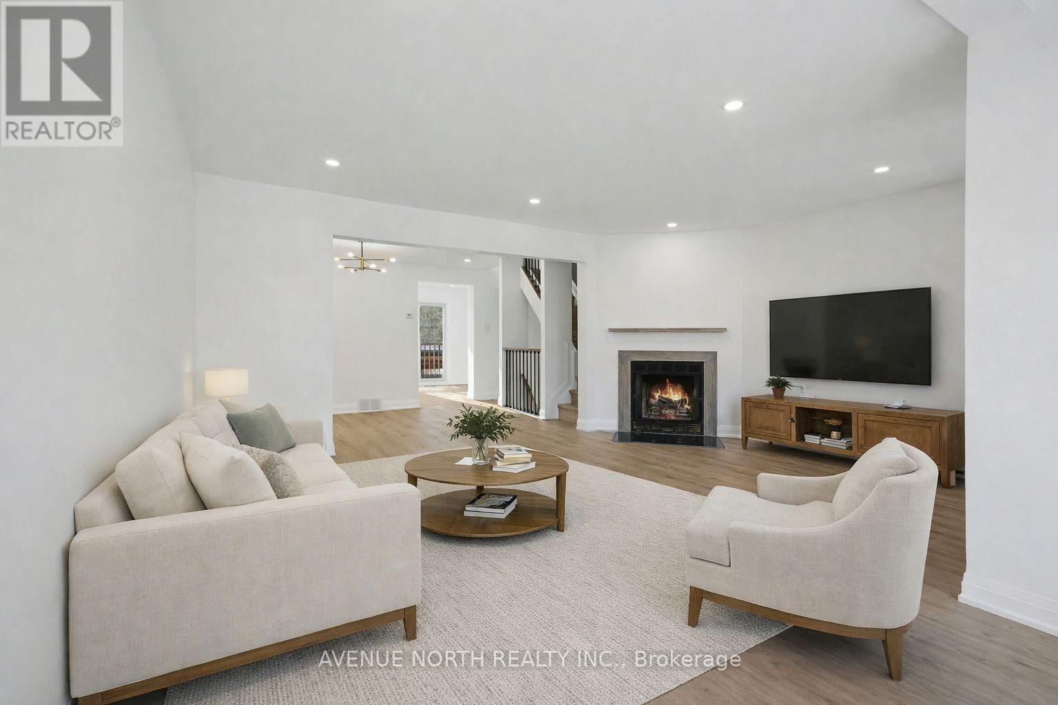 4 Marielle Court, Ottawa, ON - Indoor Photo Showing Living Room With Fireplace