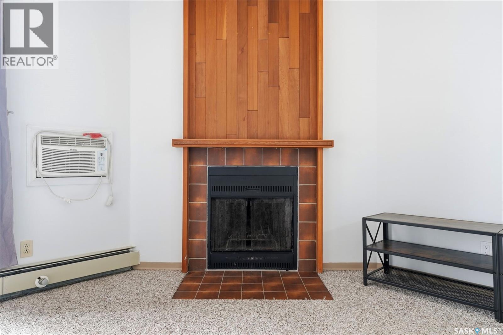 205 855 Wollaston Crescent, Saskatoon, SK - Indoor With Fireplace