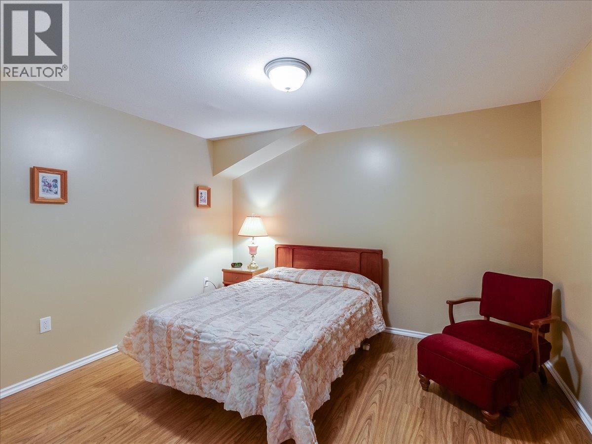 7136 Wright Way, Trail, BC - Indoor Photo Showing Bedroom