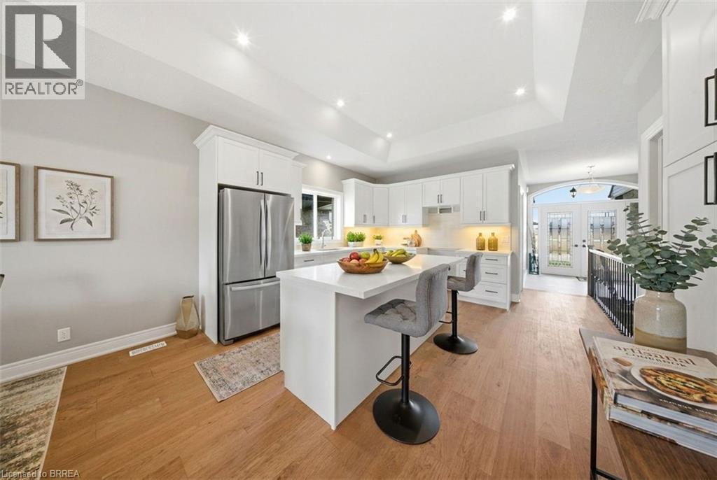Digitally Staged - 105 Craddock Boulevard, Jarvis, ON - Indoor Photo Showing Kitchen With Upgraded Kitchen