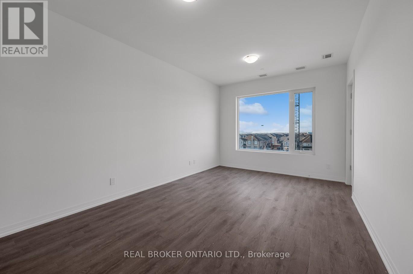 Large bedroom with oversized window - 412 - 3265 Carding Mill Trail, Oakville, ON - Indoor Photo Showing Other Room