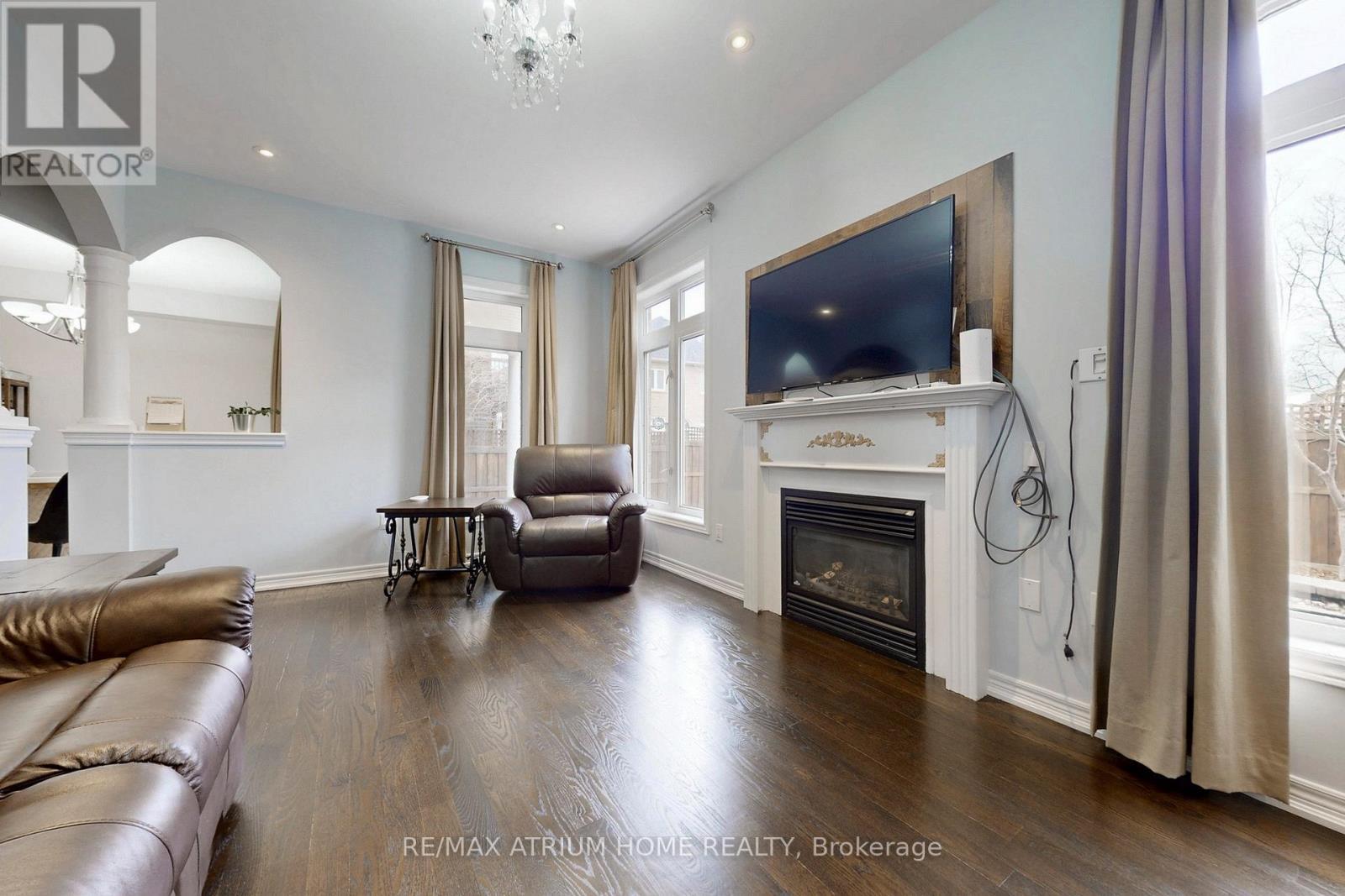5430 Oscar Peterson Boulevard, Mississauga, ON - Indoor Photo Showing Living Room With Fireplace