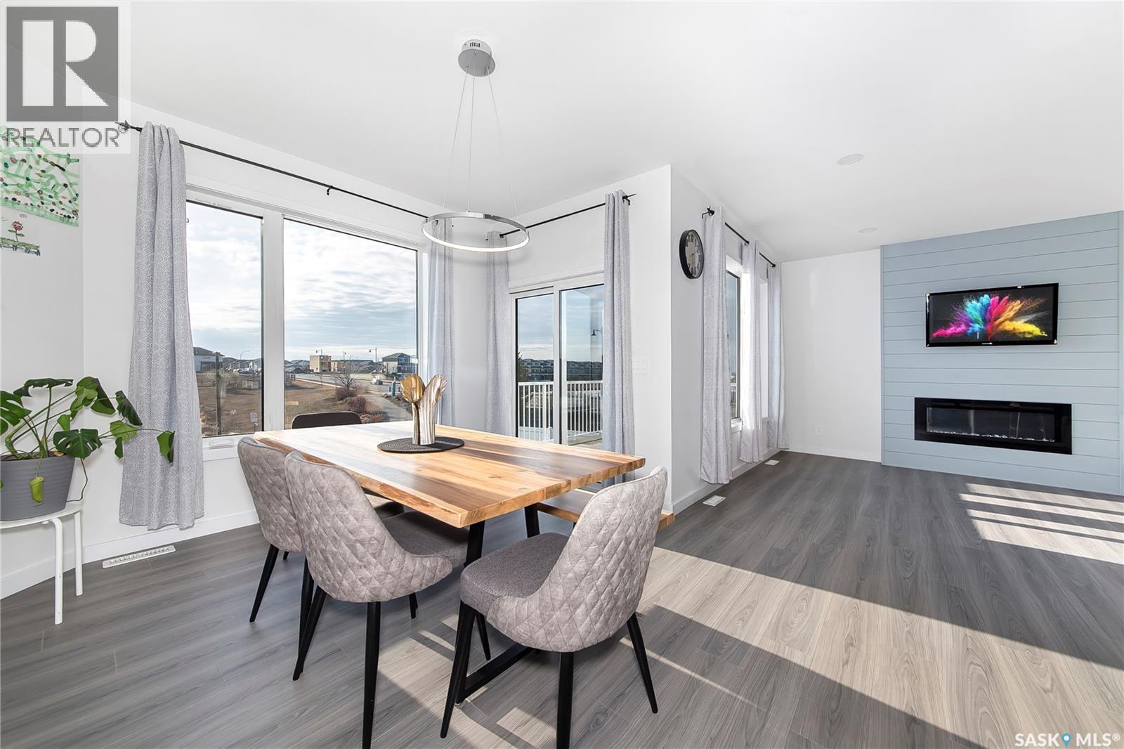 1038 Childers Court, Saskatoon, SK - Indoor Photo Showing Other Room With Fireplace