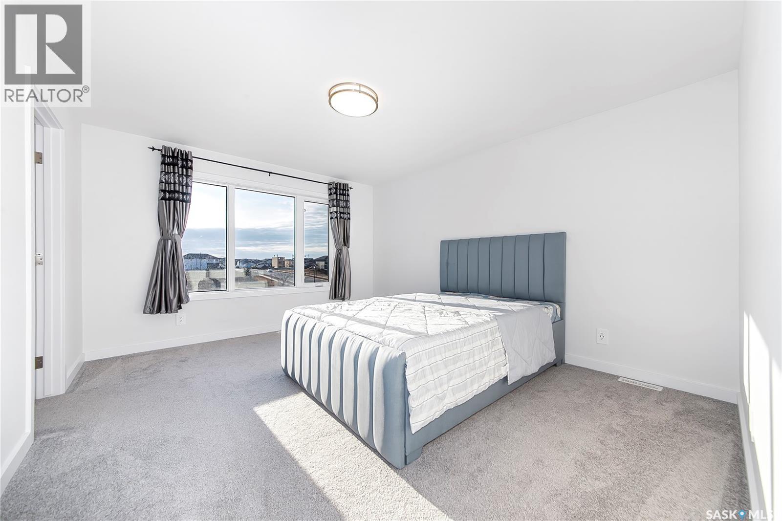 1038 Childers Court, Saskatoon, SK - Indoor Photo Showing Bedroom