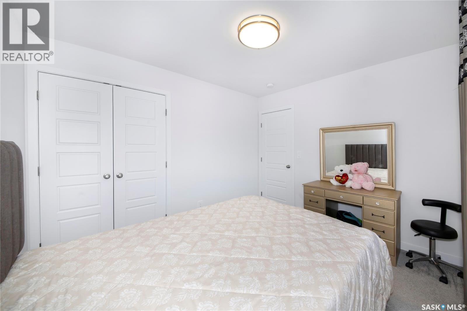 1038 Childers Court, Saskatoon, SK - Indoor Photo Showing Bedroom