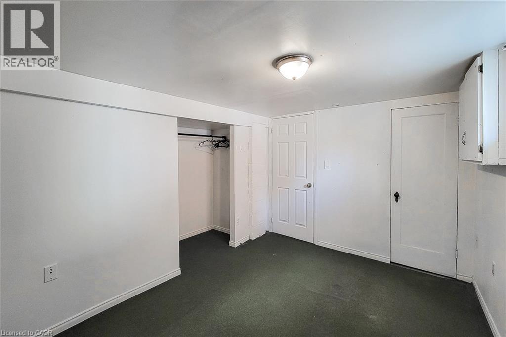 Room featuring green carpet flooring - 66 Cline Avenue Unit# Main Floor, Hamilton, ON - Indoor Photo Showing Other Room