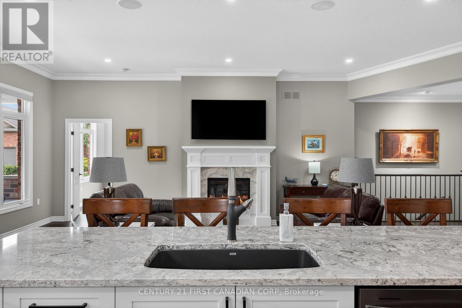 1307 Sandy Somerville Drive, London South (South A), ON - Indoor Photo Showing Kitchen With Fireplace With Double Sink With Upgraded Kitchen