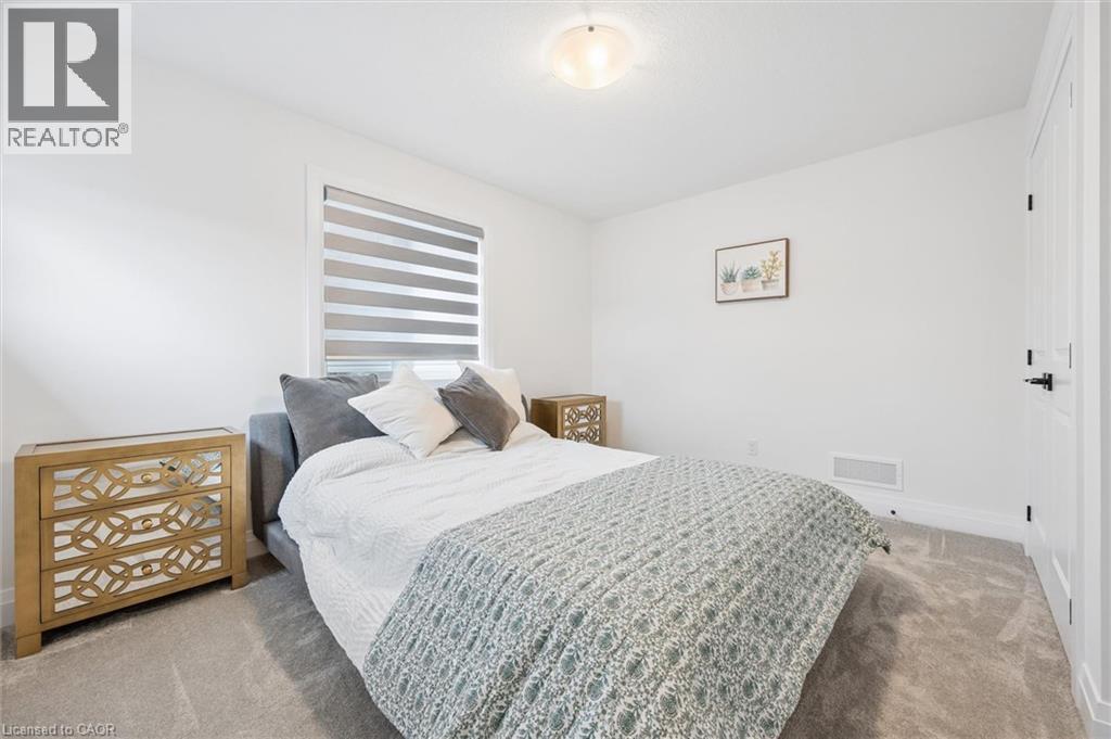 Bedroom featuring white walls and grey carpet flooring - 213 Fallowfield Drive, Kitchener, ON - Indoor Photo Showing Bedroom