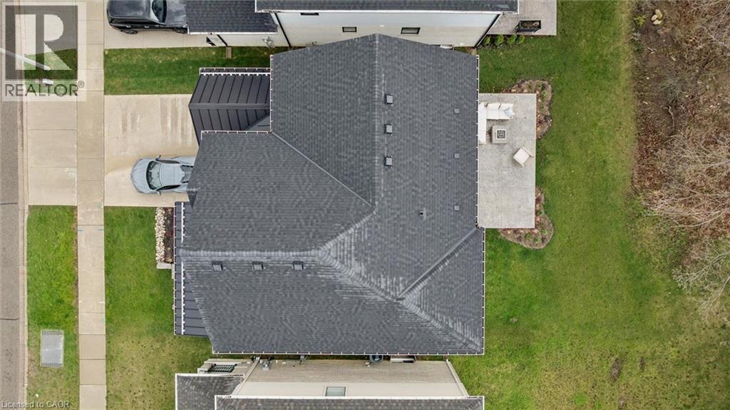 Asphalt shingle roof with a prominent gabled design - 213 Fallowfield Drive, Kitchener, ON - Outdoor
