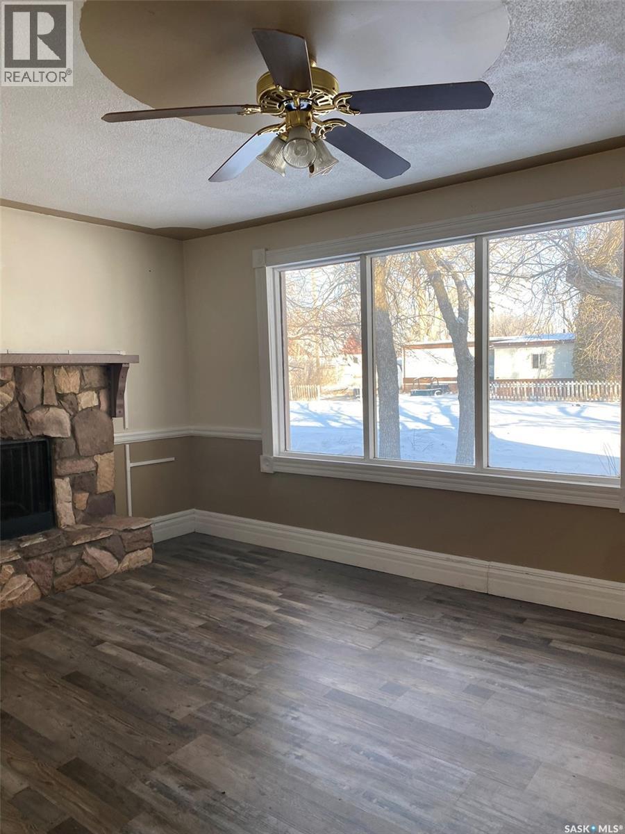 117 Prospect Avenue, Oxbow, SK - Indoor Photo Showing Other Room With Fireplace