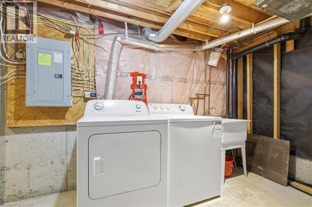 Laundry area featuring a washer, dryer, and utility sink - 110 Milton Avenue, Cambridge, ON - Indoor Photo Showing Laundry Room