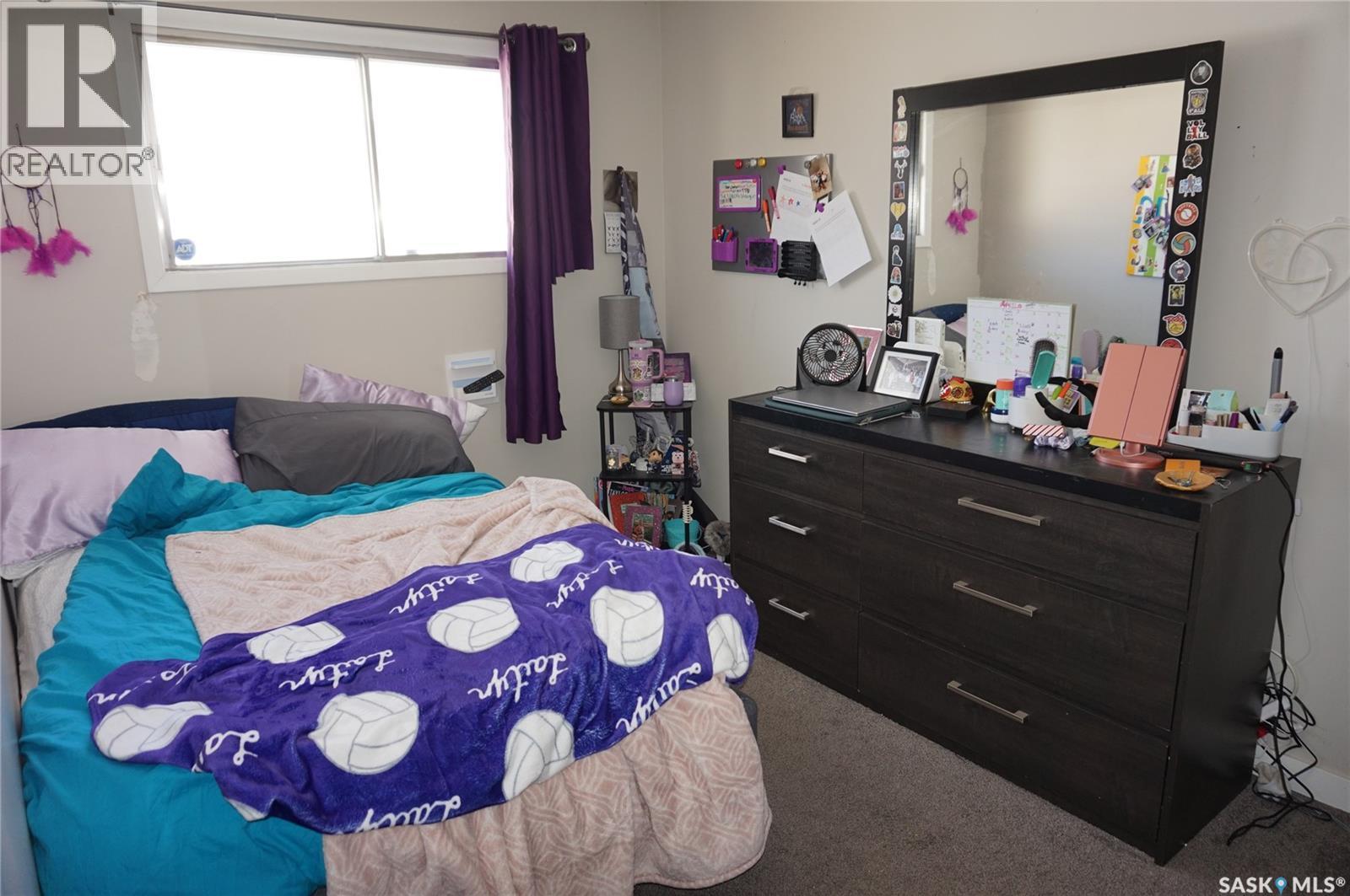 91 Plant Crescent, Regina, SK - Indoor Photo Showing Bedroom