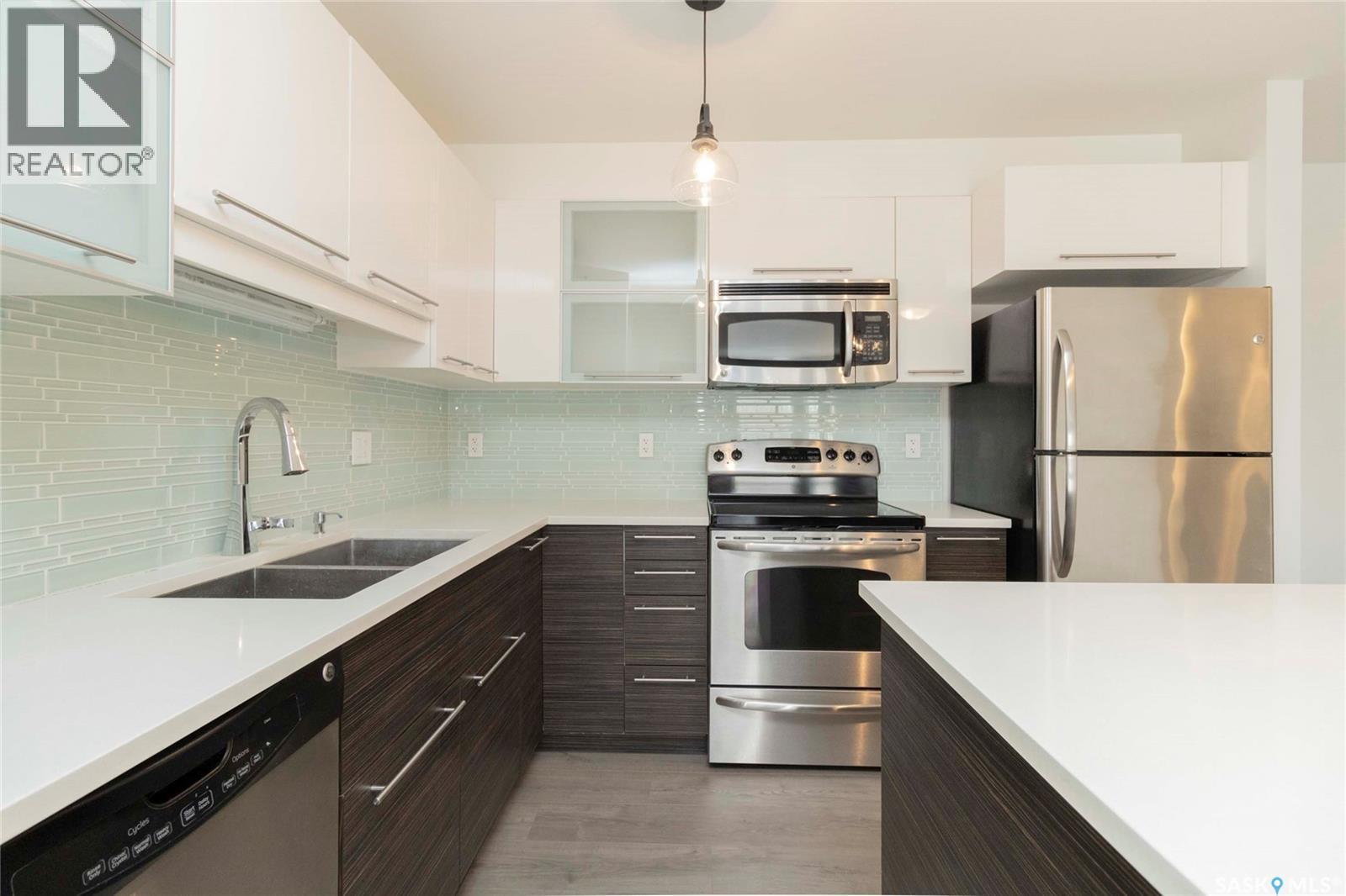 307A 415 Hunter Road, Saskatoon, SK - Indoor Photo Showing Kitchen With Stainless Steel Kitchen With Double Sink With Upgraded Kitchen
