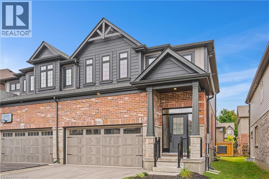 Contemporary brick and dark siding exterior with prominent gables - 1026 Wright Drive, Midland, ON - Outdoor