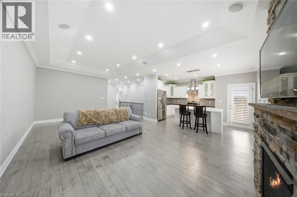 194 Donly Drive S Unit# 12, Simcoe, ON - Indoor Photo Showing Living Room With Fireplace