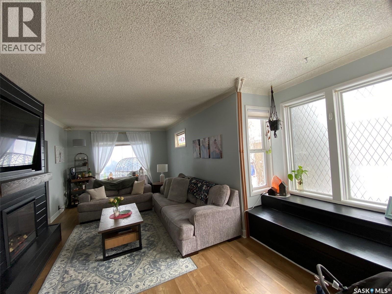 216 Second Avenue N, Yorkton, SK - Indoor Photo Showing Living Room With Fireplace