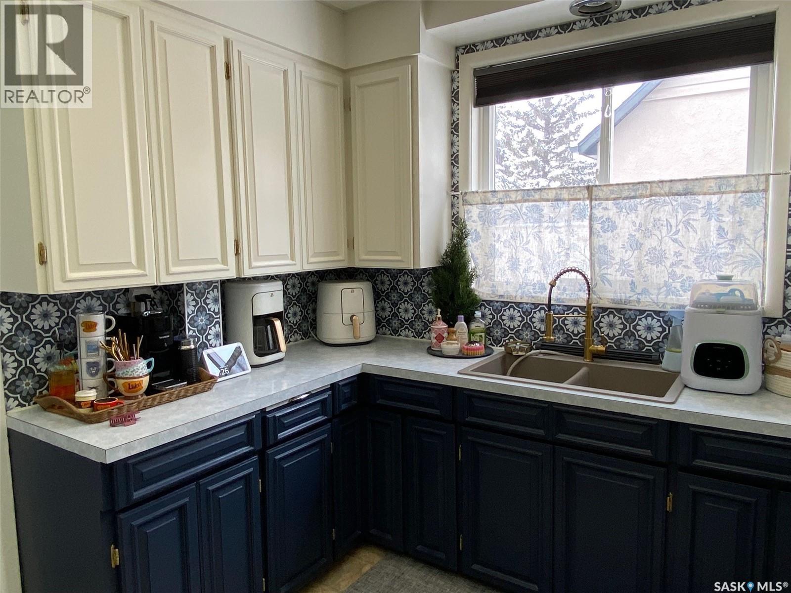 216 Second Avenue N, Yorkton, SK - Indoor Photo Showing Kitchen With Double Sink