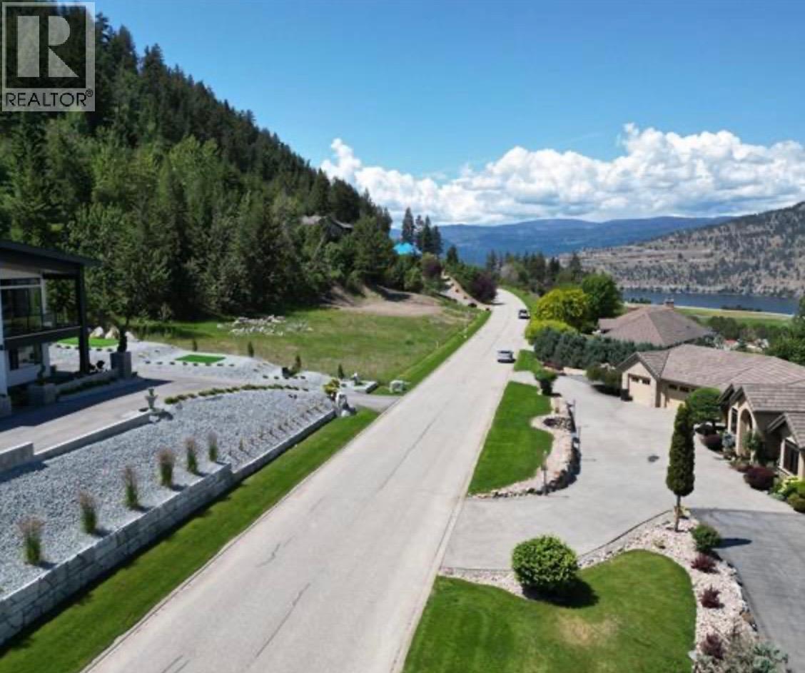 Looking West from the property Aerial. property starts just past the rock wall on the left. Property has been prepped since this photo. - 152 Sunset Boulevard, Vernon, BC