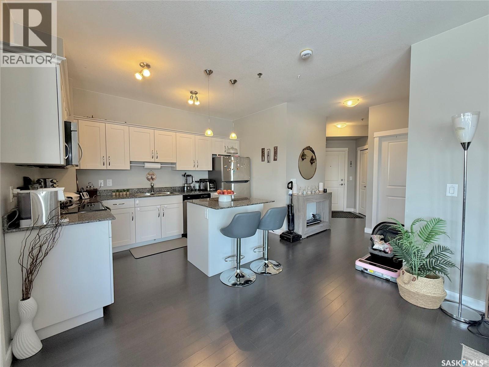 202 702 Hart Road, Saskatoon, SK - Indoor Photo Showing Kitchen With Double Sink