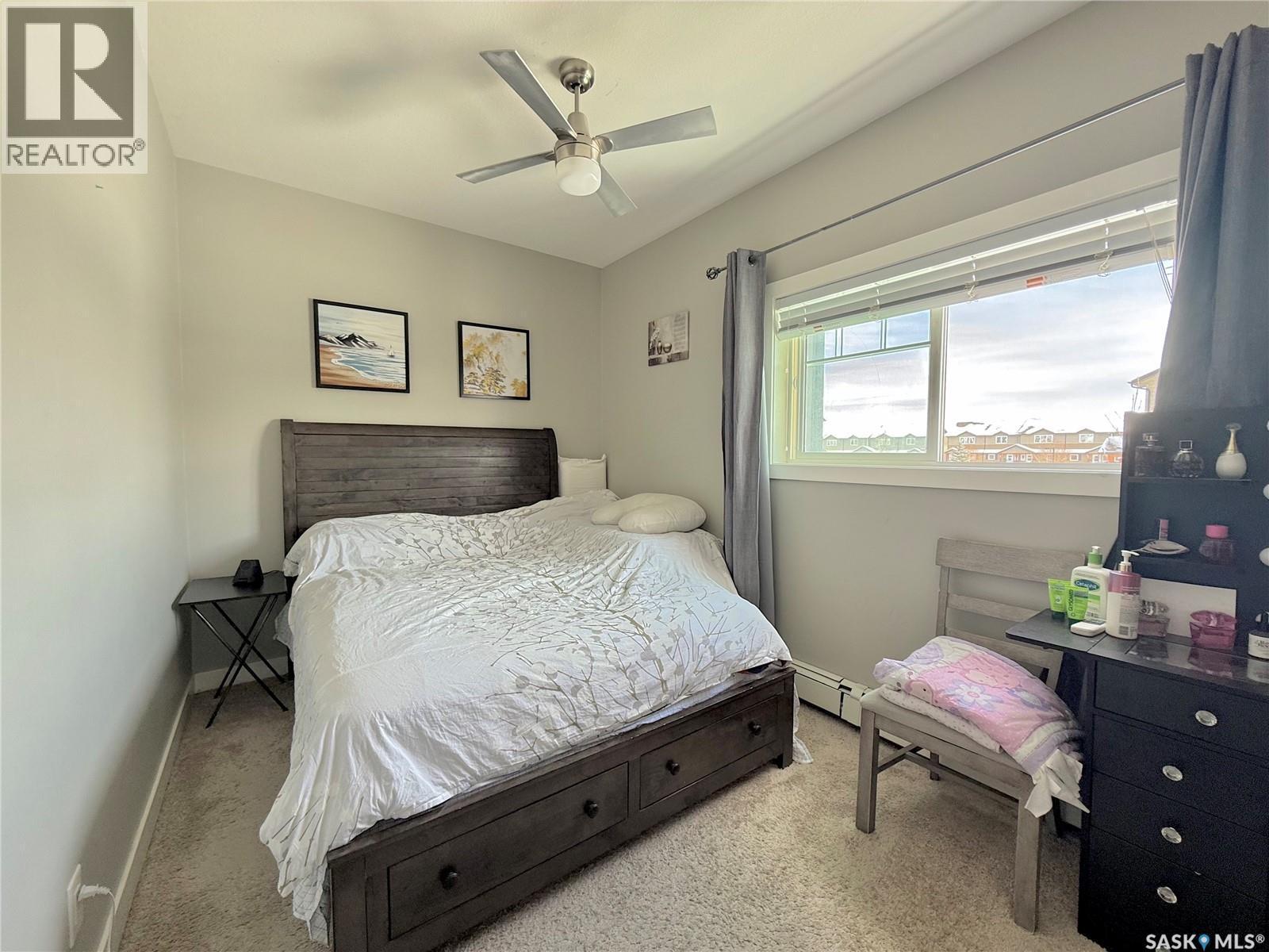 202 702 Hart Road, Saskatoon, SK - Indoor Photo Showing Bedroom