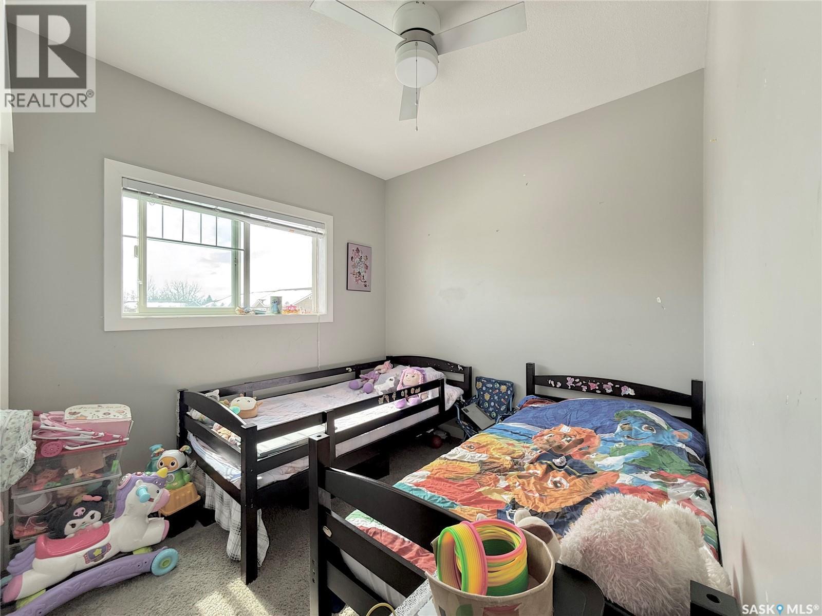 202 702 Hart Road, Saskatoon, SK - Indoor Photo Showing Bedroom