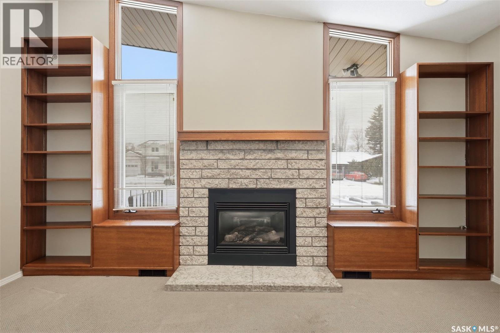 117 Mount Allison Crescent, Saskatoon, SK - Indoor Photo Showing Living Room With Fireplace