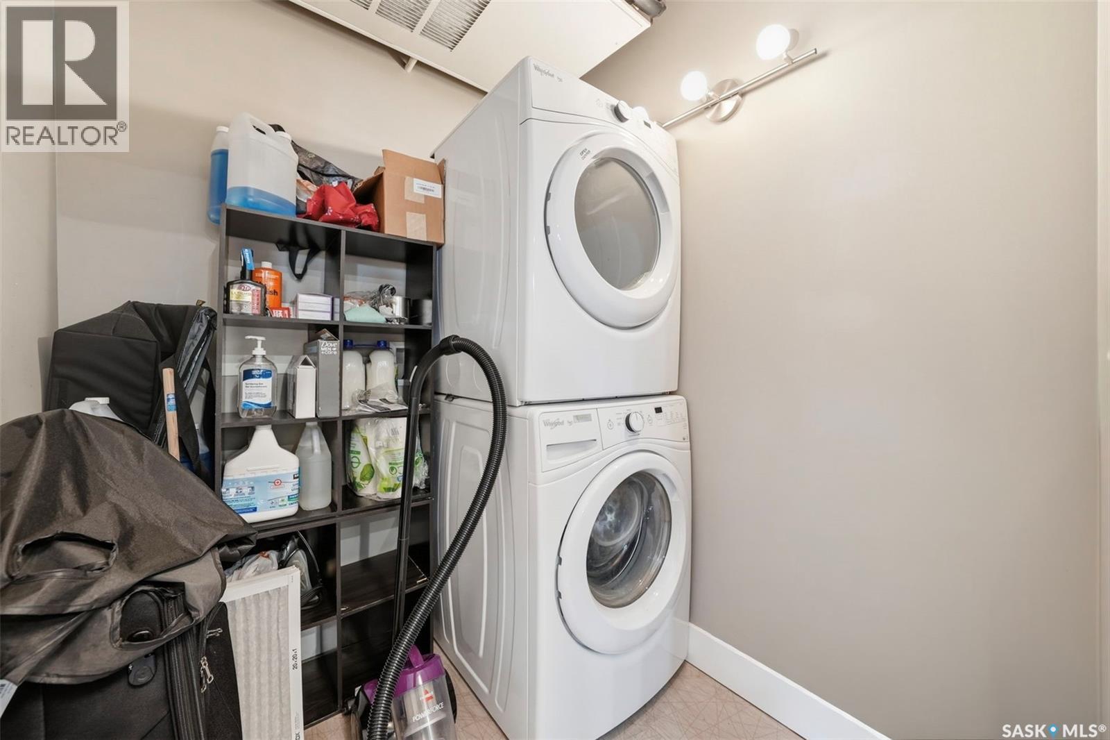 202 415 Maningas Bend, Saskatoon, SK - Indoor Photo Showing Laundry Room