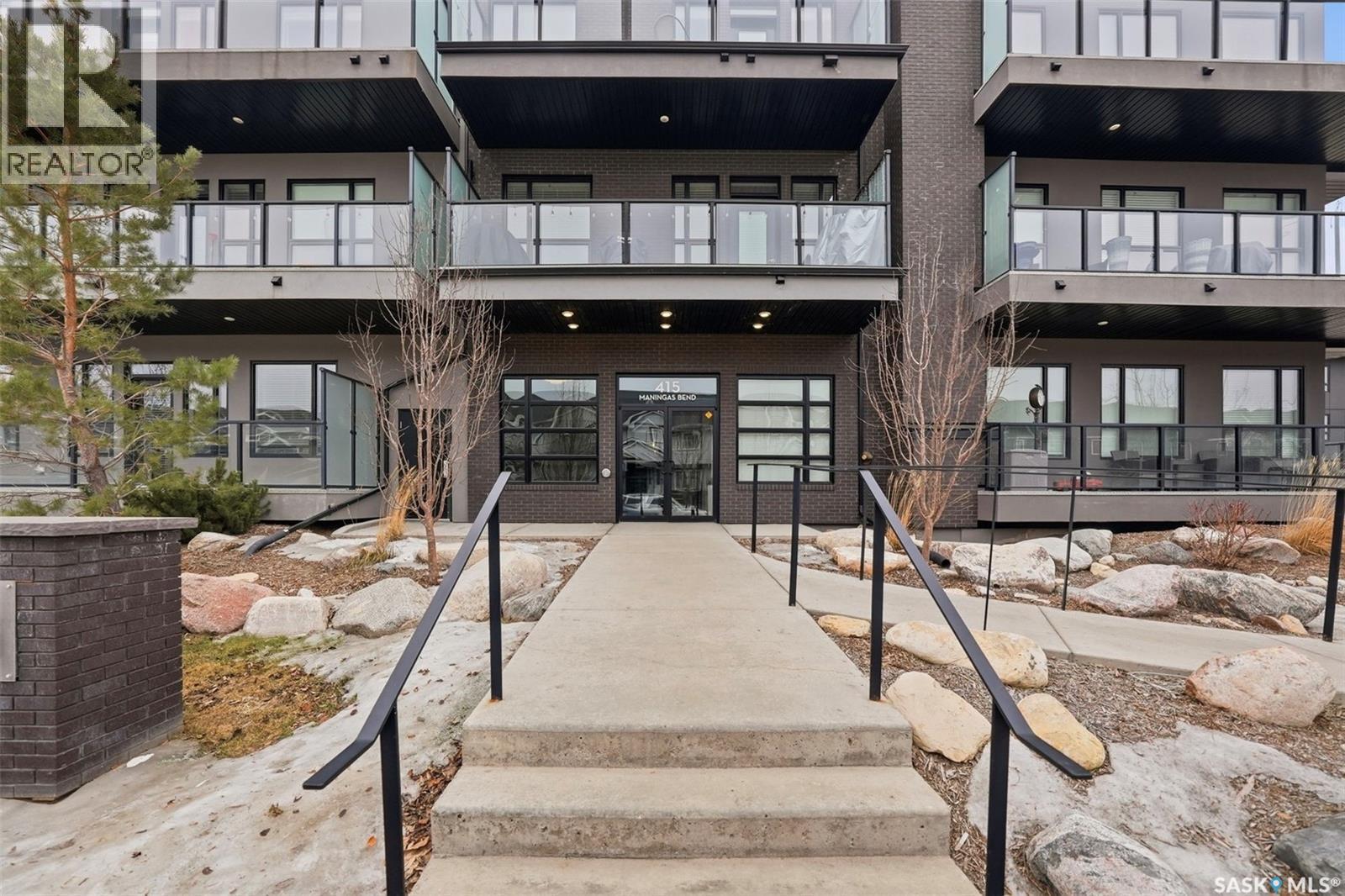 202 415 Maningas Bend, Saskatoon, SK - Outdoor With Balcony With Facade