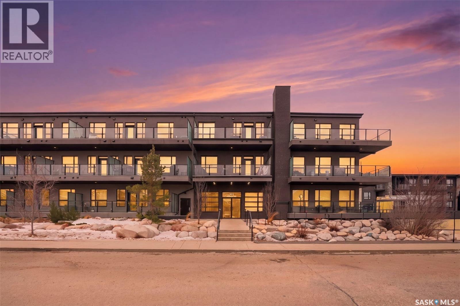 202 415 Maningas Bend, Saskatoon, SK - Outdoor With Balcony With Facade